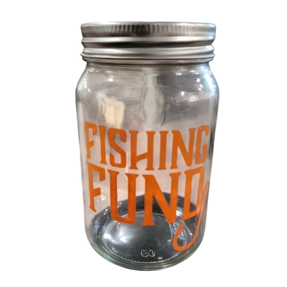 Bank glass jar with screw on lid says Fising Fund top has an opening for coins